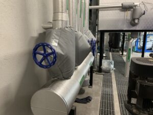 Steam pipework header and valves insulated and clad by Lagforce
