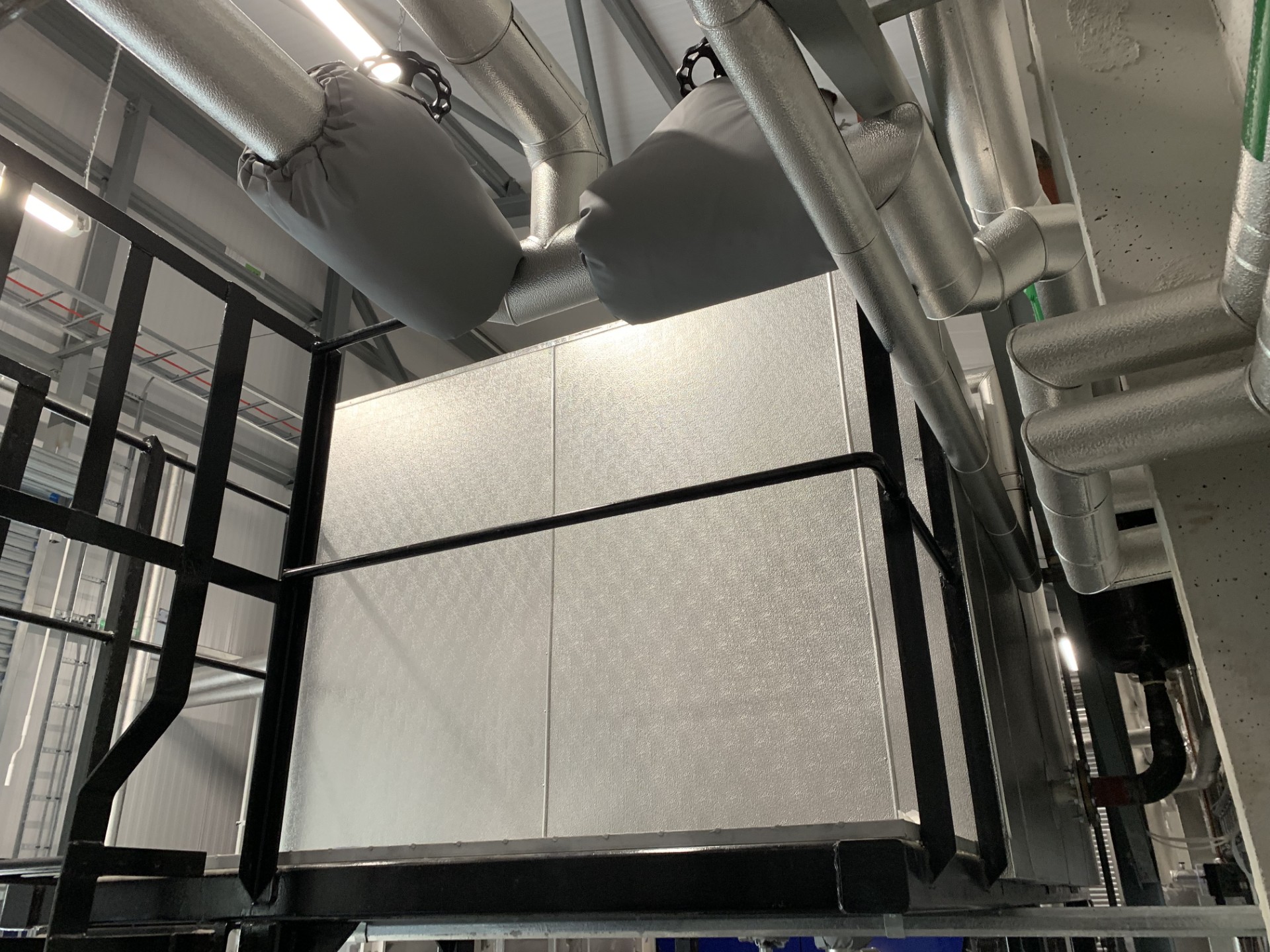Lagforce hot well tank insulation finished with aluminium cladding