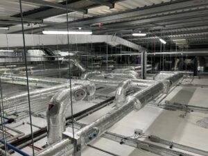 Ventilation ducting and water services pipework insulated with foiled fiberglass by Lagforce in Naas in Kildare