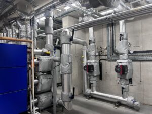 Heating circulation pumps with custom made high efficiency thermal cover supplied by Lagforce