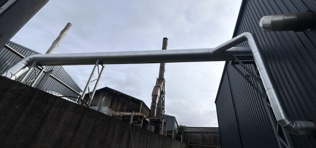Full external boiler flue route on steel supports, insulated with wired mat and clad in aluminium, Co. Meath