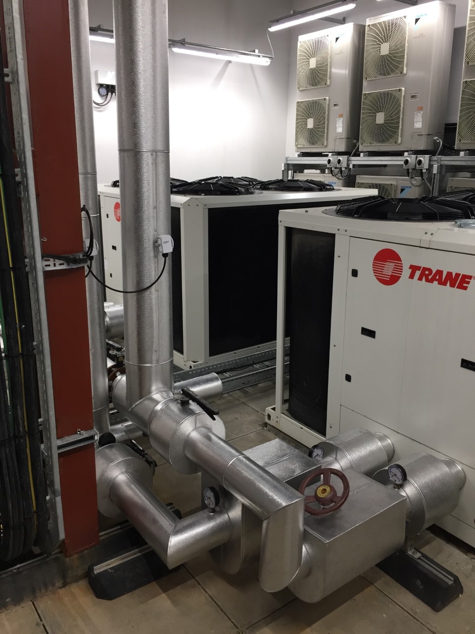 Insulated chilled water pipework connected to industrial chiller plant
